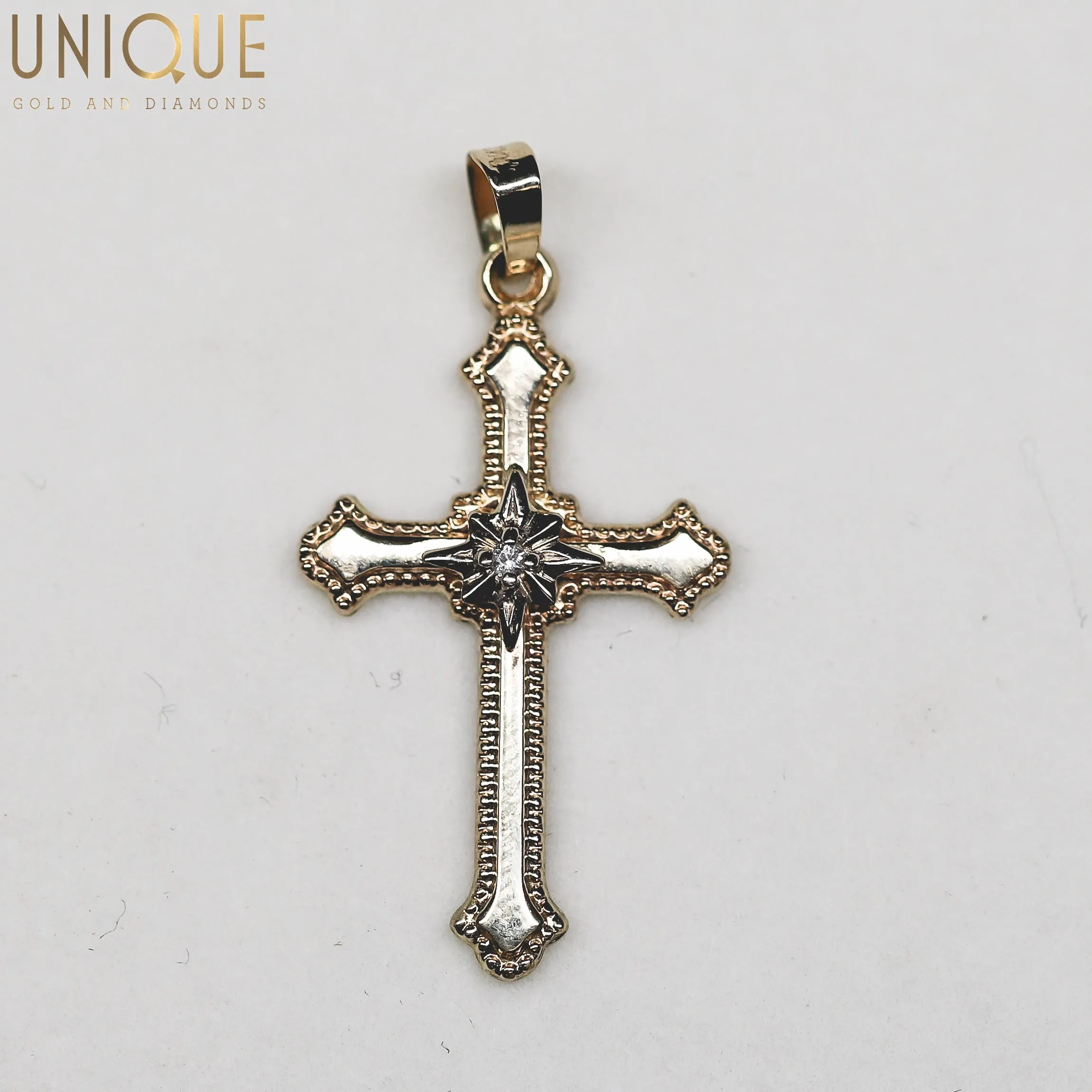 14 karat gold cross
