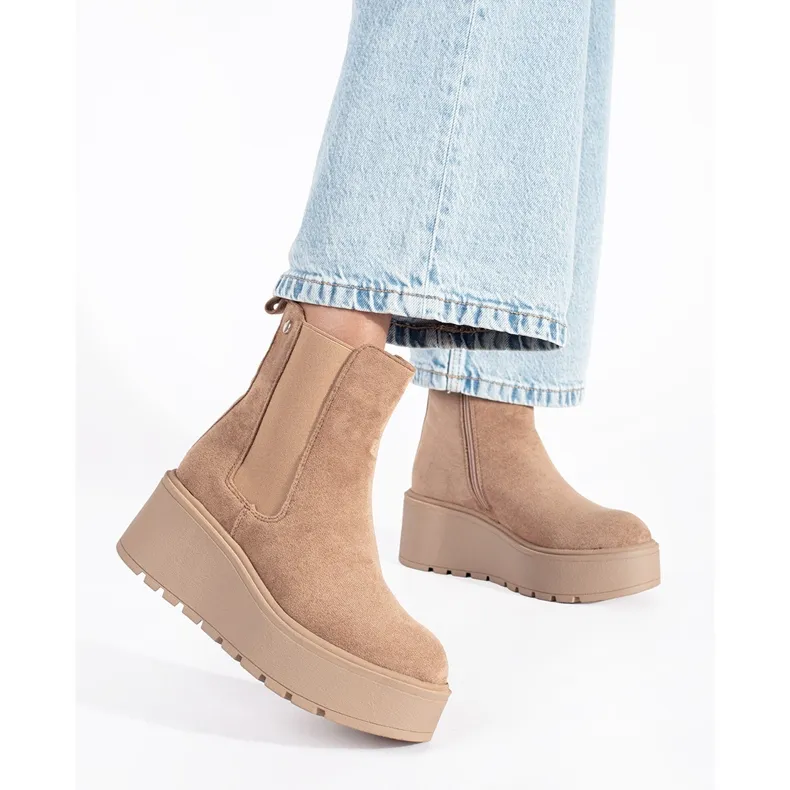 Beige suede wedge boots