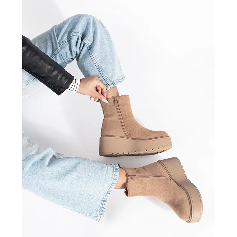 Beige suede wedge boots