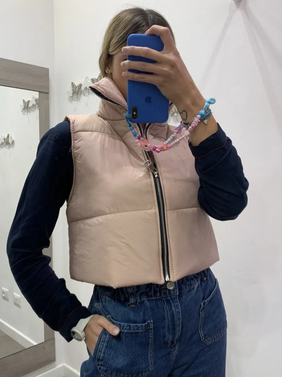 Piumino smanicato rosa